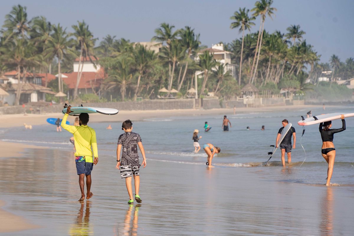 Palm-lined reef break at Ahangama on the South Coast of Sri Lanka